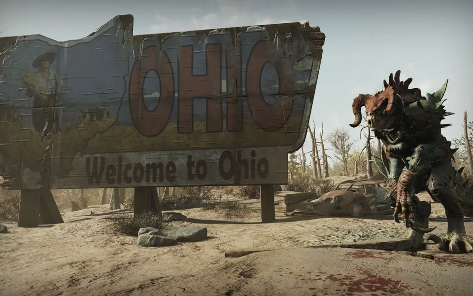 A deathclaw beside a Welcome to Ohio sign